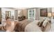 Bedroom with an office nook, hardwood floors and natural light at 10875 Shagbark Trl, Roswell, GA 30075