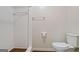 Clean bathroom with tiled shower and neutral fixtures at 1977 Kensington High Sw St, Lilburn, GA 30047