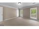 Inviting bedroom with a window view, providing natural light and comfortable living space at 607 Lees Mill Rd, Fayetteville, GA 30214