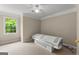 Bedroom featuring tanning bed by window, providing an in-home spa experience at 607 Lees Mill Rd, Fayetteville, GA 30214