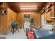 Garage with built-in storage cabinets, grill, sink, and work area, providing organization and functionality at 607 Lees Mill Rd, Fayetteville, GA 30214