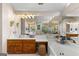 The main bathroom features dual sinks, vanity, tub and large mirrors at 607 Lees Mill Rd, Fayetteville, GA 30214