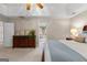Main bedroom featuring a trey ceiling, carpet, and ensuite bathroom at 607 Lees Mill Rd, Fayetteville, GA 30214