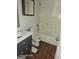 Standard bathroom with a shower-tub combination, toilet, and vanity sink at 115 Lakeview Dr, Stockbridge, GA 30281