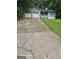 Charming single-story home with a spacious front yard and a two-car garage at 115 Lakeview Dr, Stockbridge, GA 30281