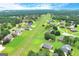 Aerial view of houses surrounding neighborhood runway at 335 Canvasback Trl, Locust Grove, GA 30248