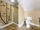 Neutral bathroom that features a shower, toilet and tree art at 335 Canvasback Trl, Locust Grove, GA 30248