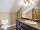 Neutral bathroom with dark cabinets and a mirror at 335 Canvasback Trl, Locust Grove, GA 30248
