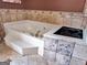 Large garden tub with tile surround at 335 Canvasback Trl, Locust Grove, GA 30248