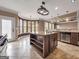 Kitchen boasts an island, stainless appliances, and lots of counter space at 335 Canvasback Trl, Locust Grove, GA 30248