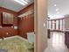 Spacious laundry room featuring built-in shelving, a sink, and tile floors at 335 Canvasback Trl, Locust Grove, GA 30248