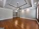 Spacious living room with hardwood floors, recessed lighting, and ceiling fan at 335 Canvasback Trl, Locust Grove, GA 30248
