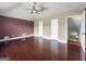 Main bedroom with high vaulted ceilings, dark trim and flooring, and many windows at 335 Canvasback Trl, Locust Grove, GA 30248