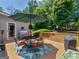 Back deck featuring an outdoor dining area with shade umbrella at 135 Acorn Dr, Mcdonough, GA 30253