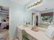 Vanity area in a bathroom featuring pale blue walls at 135 Acorn Dr, Mcdonough, GA 30253