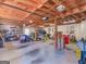 Large garage with storage space and ample room for vehicles and equipment at 135 Acorn Dr, Mcdonough, GA 30253