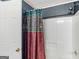 Enclosed shower featuring a curtain with a floral pattern at 135 Acorn Dr, Mcdonough, GA 30253