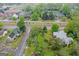 Neighborhood aerial showcasing tree coverage, street access, and diverse architectural styles at 109 Stockbridge Rd, Jonesboro, GA 30236