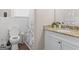 Bathroom featuring a toilet, vanity with granite countertop, and a shower with a curtain at 109 Stockbridge Rd, Jonesboro, GA 30236