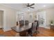 Spacious conference room with hardwood floors, ceiling fan, and neutral wall colors at 109 Stockbridge Rd, Jonesboro, GA 30236