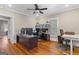 Office featuring hardwood floors, a ceiling fan, and abundant natural light through bright windows at 109 Stockbridge Rd, Jonesboro, GA 30236