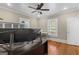 Office featuring hardwood floors, a ceiling fan, and abundant natural light through bright windows at 109 Stockbridge Rd, Jonesboro, GA 30236