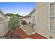 Private patio area featuring patio furniture, lush landscaping, and a cozy outdoor space at 1025 Pinehurst Dr, Peachtree City, GA 30269