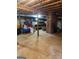 Unfinished basement with concrete floor, exposed brick, and wood support beams ready for customization at 619 E College St, Bowdon, GA 30108