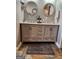Bathroom vanity with double sinks and modern round mirrors at 619 E College St, Bowdon, GA 30108
