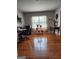 Inviting living room featuring hardwood floors and an abundance of natural light from the lovely window at 619 E College St, Bowdon, GA 30108