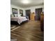 Spacious main bedroom with hardwood floors and ample natural light at 619 E College St, Bowdon, GA 30108