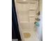Clean shower stall with built-in shelving and a sleek showerhead at 619 E College St, Bowdon, GA 30108