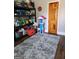 This room provides ample storage with installed shelving and modern vinyl flooring at 619 E College St, Bowdon, GA 30108