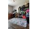 This room provides ample storage with installed shelving and modern vinyl flooring at 619 E College St, Bowdon, GA 30108