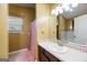 Clean bathroom featuring a vanity with sink, mirror, and tub/shower combo at 6403 Heritage Run, Morrow, GA 30260