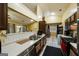 Functional kitchen with wood cabinets, tile floors, and a view of the backyard at 6403 Heritage Run, Morrow, GA 30260