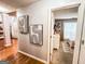Hallway with decorative artwork leading to the bedroom at 329 Royal Crescent Way, Stockbridge, GA 30281