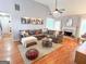 Beautifully staged living room featuring hardwood floors and neutral decor at 329 Royal Crescent Way, Stockbridge, GA 30281