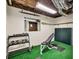 Basement fitness area with weights and mirrored wall at 513 Viridian Vw, Peachtree City, GA 30269