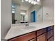 Bathroom vanity featuring a white countertop and stained wood cabinets at 471 Lanier Ct, Hiram, GA 30141