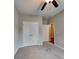 Comfortable bedroom with ceiling fan and access to closet space at 471 Lanier Ct, Hiram, GA 30141