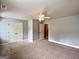 Spacious bedroom with neutral walls, carpet and ceiling fan at 137 Nobility Ln, Mcdonough, GA 30252
