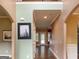 Spacious hallway with hardwood floors, archways, and neutral paint tones at 137 Nobility Ln, Mcdonough, GA 30252