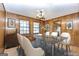 Dining room with hardwood floors, modern chandelier, and furniture at 160 Pine Trail Rd, Fayetteville, GA 30214