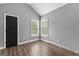 Bedroom with vaulted ceiling and window at 355 Sturgess Run, Sharpsburg, GA 30277