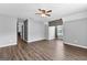 Bedroom with a wood accent wall, neutral walls, and wood-look floors at 355 Sturgess Run, Sharpsburg, GA 30277