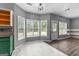 Bright breakfast nook with large windows and tile flooring at 355 Sturgess Run, Sharpsburg, GA 30277