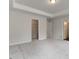 Comfortable carpeted bedroom with tray ceiling and closet at 13 Butternut Way # 120B, Auburn, GA 30011