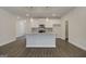 Large, open kitchen with modern appliances, island, and ample storage space at 13 Butternut Way # 120B, Auburn, GA 30011