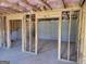 Unfinished basement with wood frame, concrete foundation and concrete floor at 42 Avian Way # 128B, Auburn, GA 30011